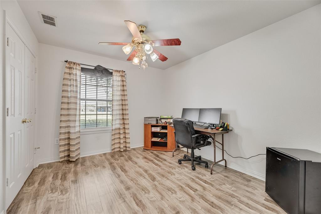 613 Torero Trail Oak Point, TX 75068 - Photo 13 of 32 a view of a workspace with furniture and a window
