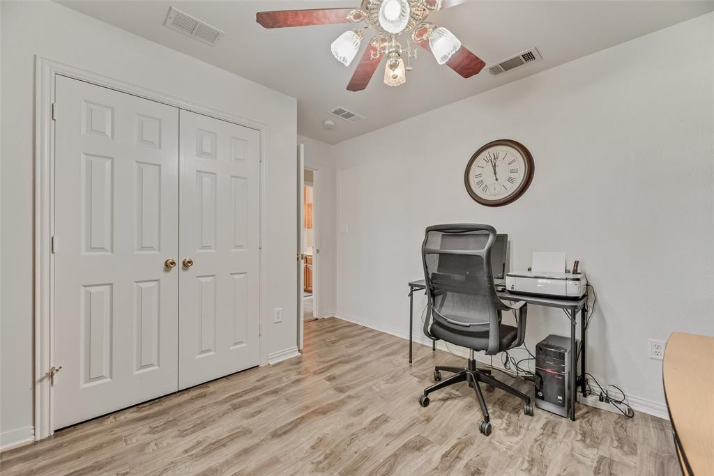 613 Torero Trail Oak Point, TX 75068 - Photo 17 of 32 a view of a workspace room with wooden floor