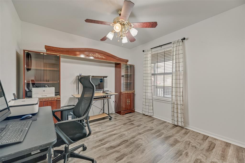 613 Torero Trail Oak Point, TX 75068 - Photo 18 of 32 a workspace with wooden floor