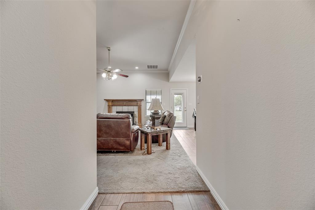 613 Torero Trail Oak Point, TX 75068 - Photo 20 of 32 a view of a dining room with furniture