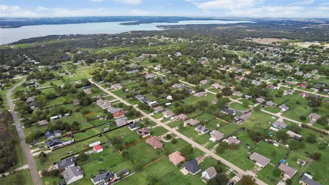 a view of city with lots of bushes