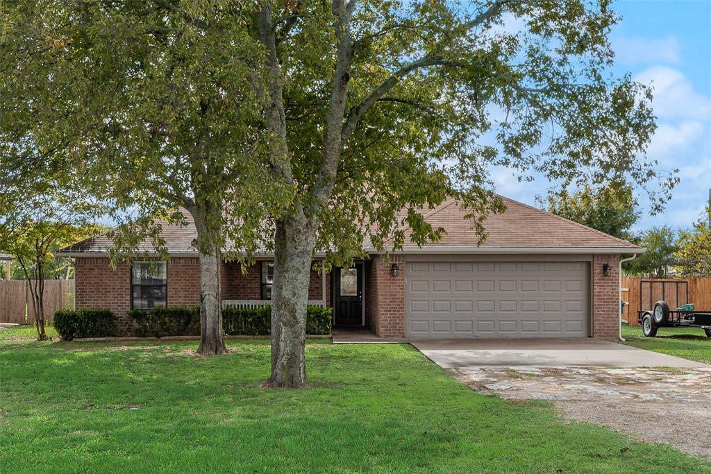 613 Torero Trail Oak Point, TX 75068 - Photo 30 of 32 a view of backyard of house with green space