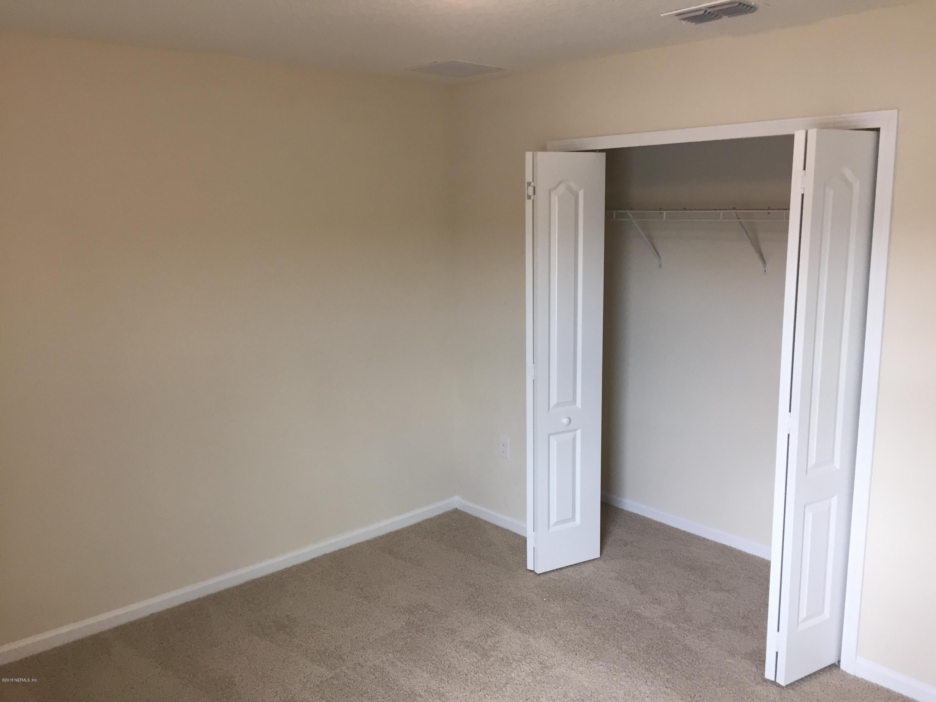 912 Deer Crossing Road St. Augustine, FL 32086 - Photo 14 of 45 a view of an empty room