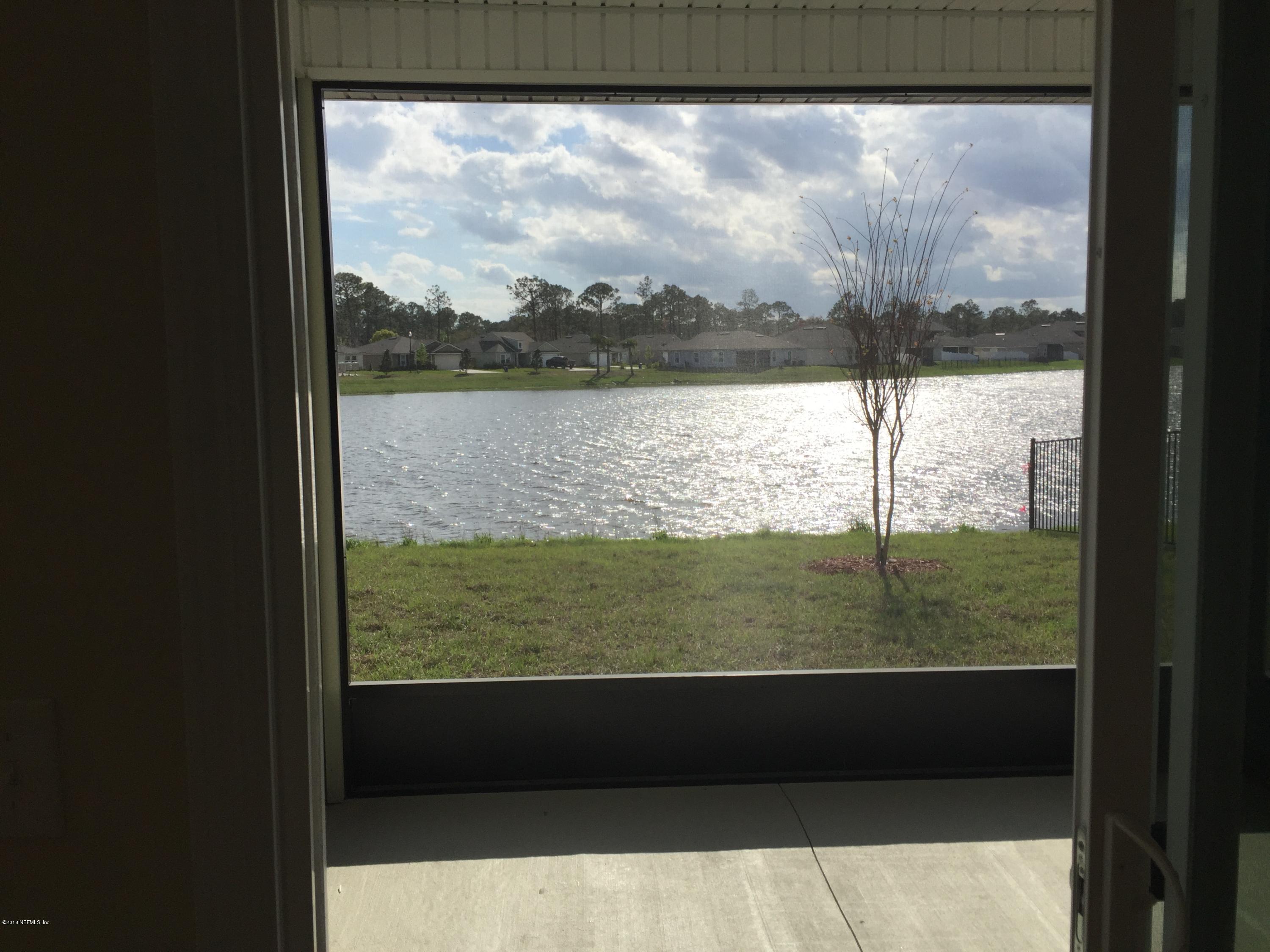 912 Deer Crossing Road St. Augustine, FL 32086 - Photo 23 of 45 a view of lake from a window