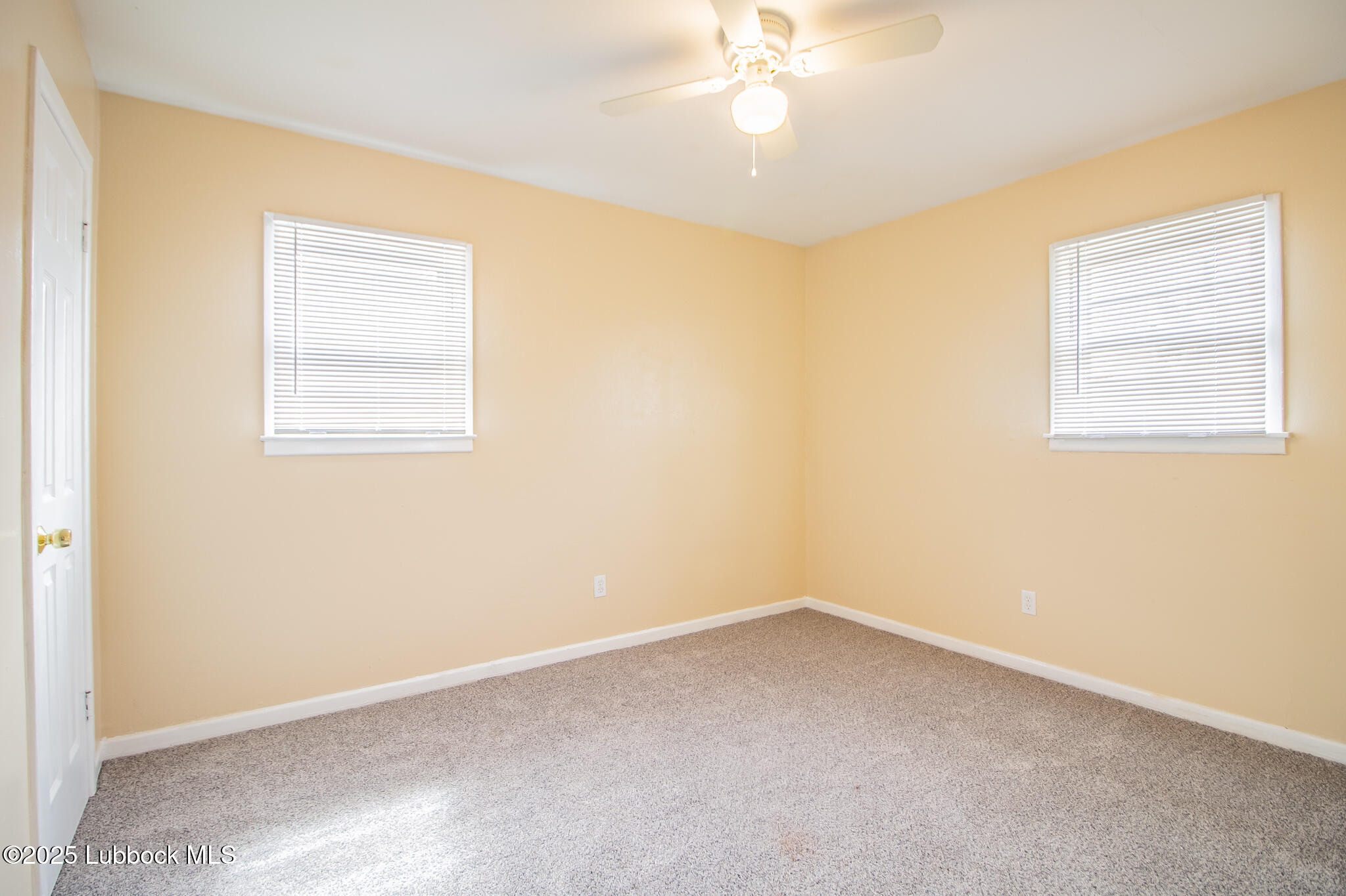2414 38th Street Lubbock, TX 79412 - Photo 13 of 20 an empty room with a window