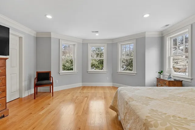 a spacious bathroom with a granite countertop tub sink and mirror