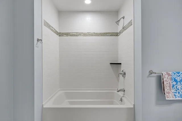 a bedroom with a workspace