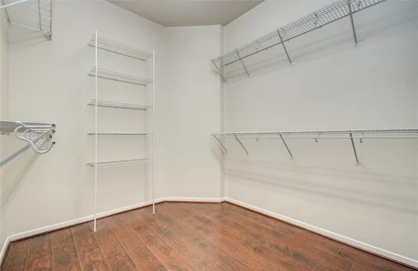 a view of a room with racks on the wall