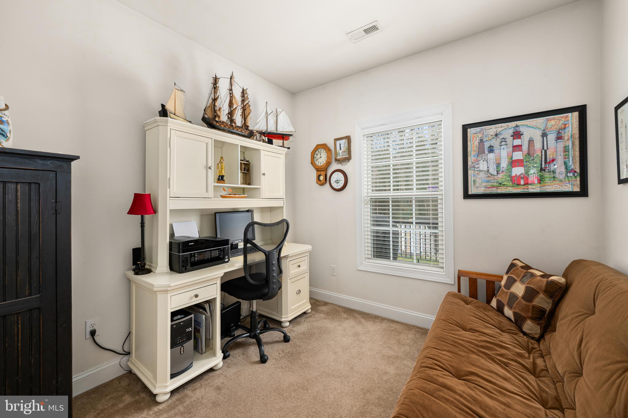 27400 Walking Run Milton, DE 19968 - Photo 14 of 35 a view of a livingroom with workspace and a window