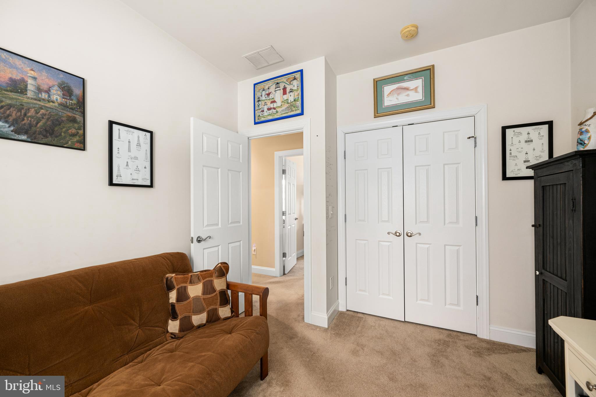 27400 Walking Run Milton, DE 19968 - Photo 15 of 35 a living room with furniture and a refrigerator