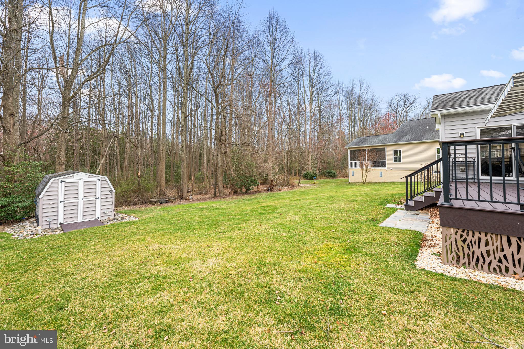 27400 Walking Run Milton, DE 19968 - Photo 22 of 35 a view of a house with backyard and porch