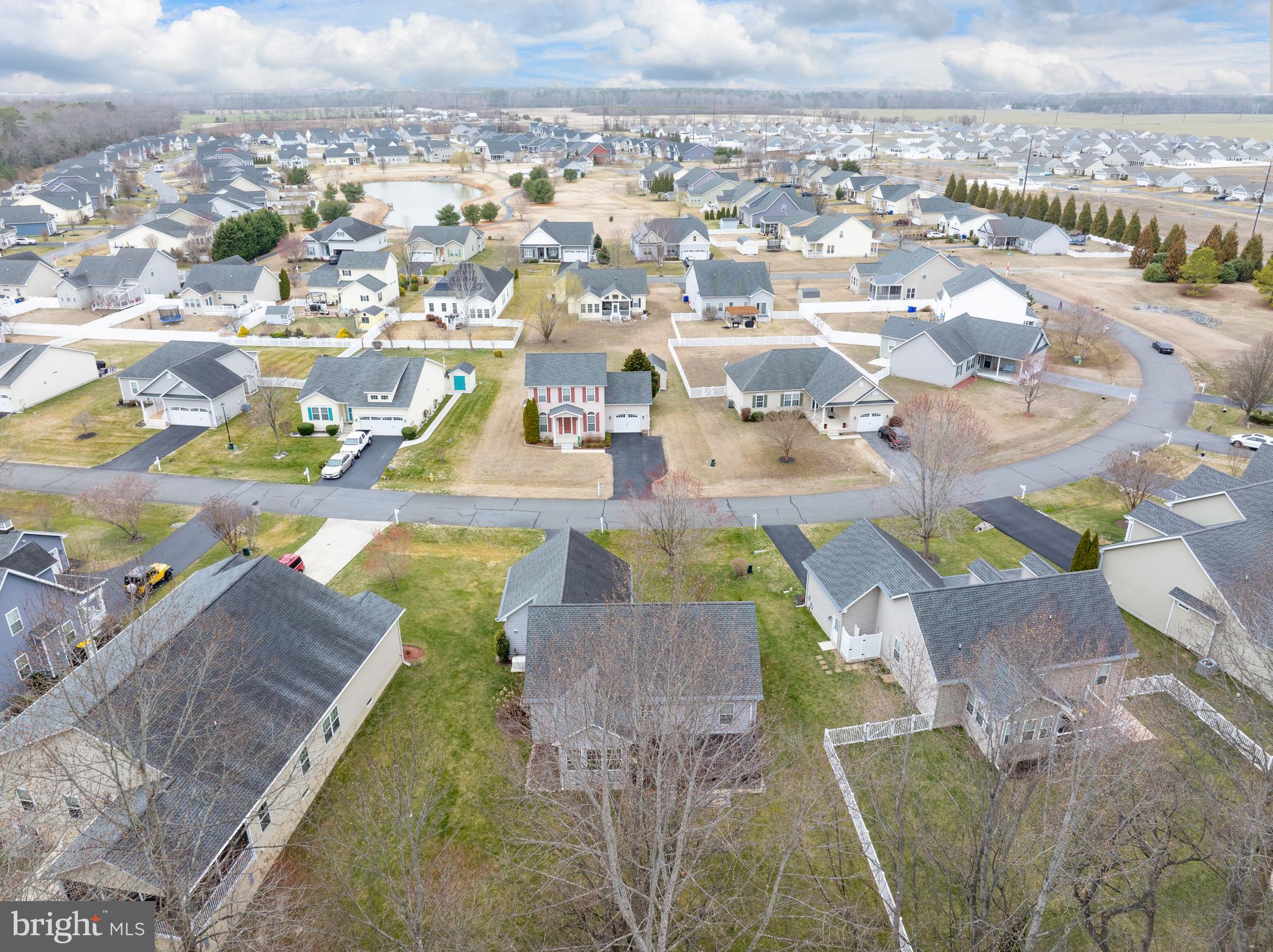 27400 Walking Run Milton, DE 19968 - Photo 27 of 35 an aerial view of residential houses with outdoor space