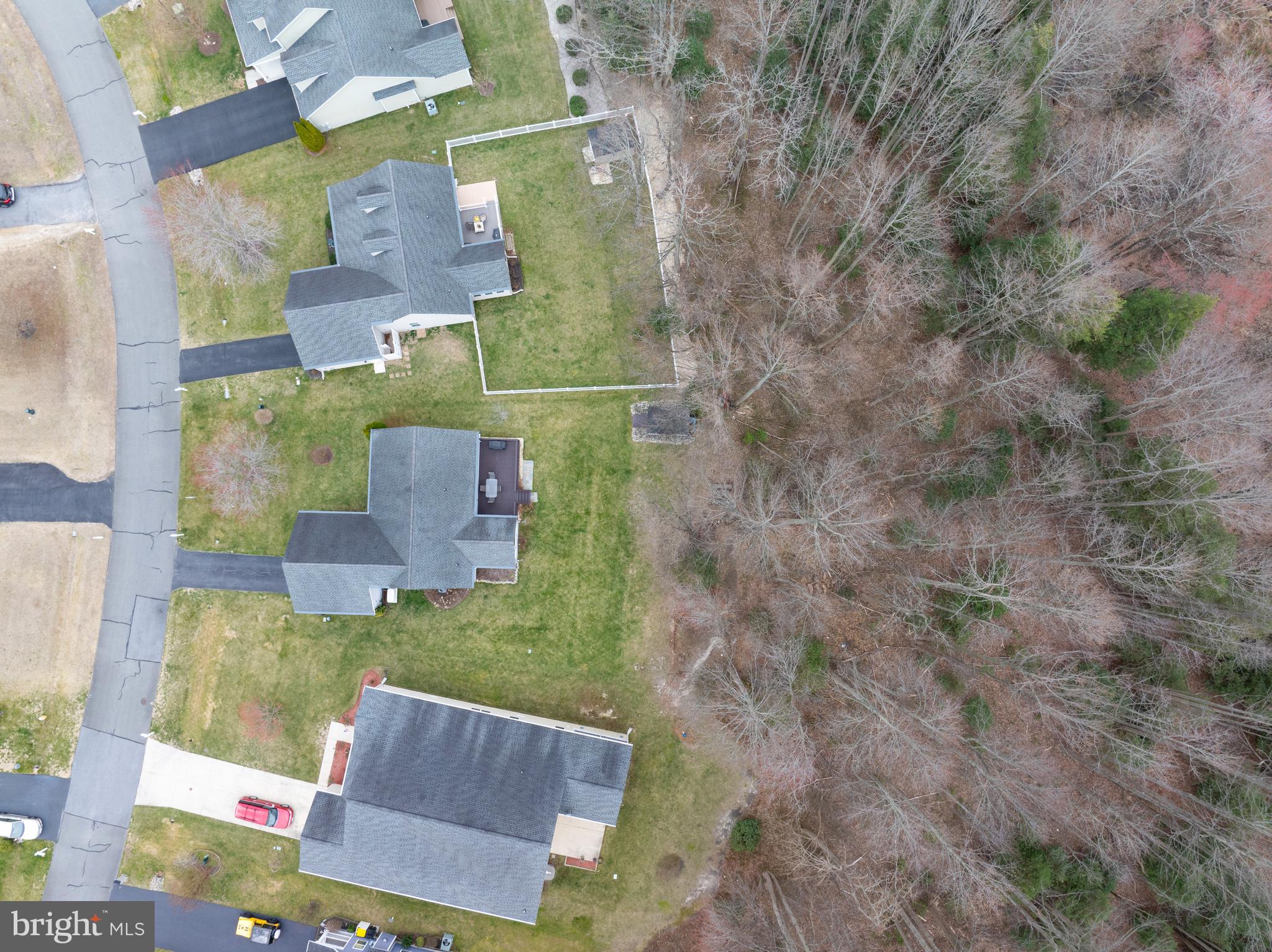 27400 Walking Run Milton, DE 19968 - Photo 28 of 35 an aerial view of a house with a yard