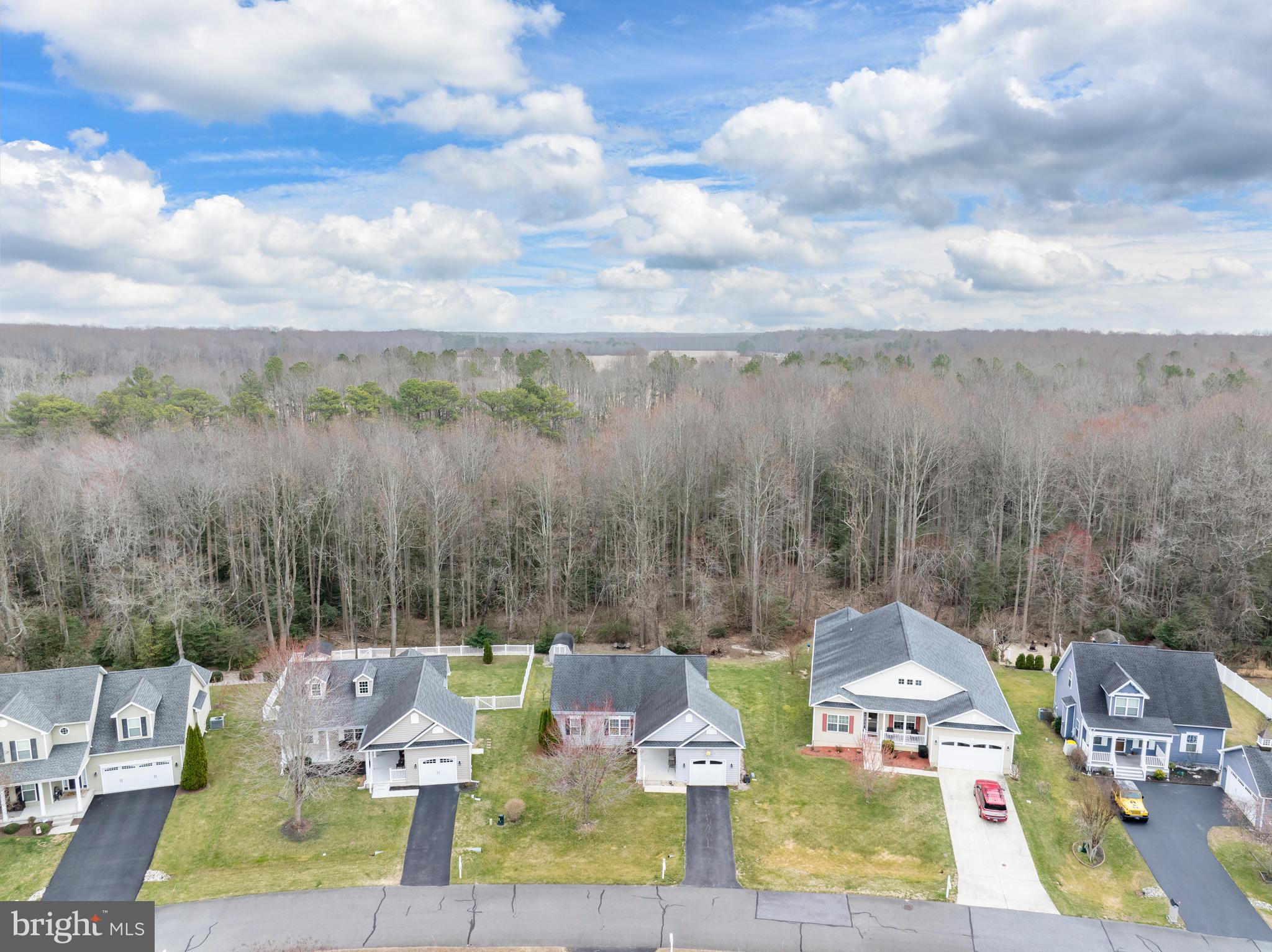 27400 Walking Run Milton, DE 19968 - Photo 29 of 35 a view of house with outdoor space and seating