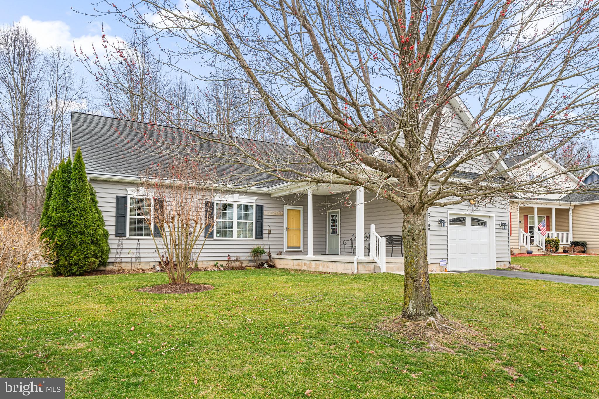 27400 Walking Run Milton, DE 19968 - Photo 32 of 35 a front view of house with yard and green space