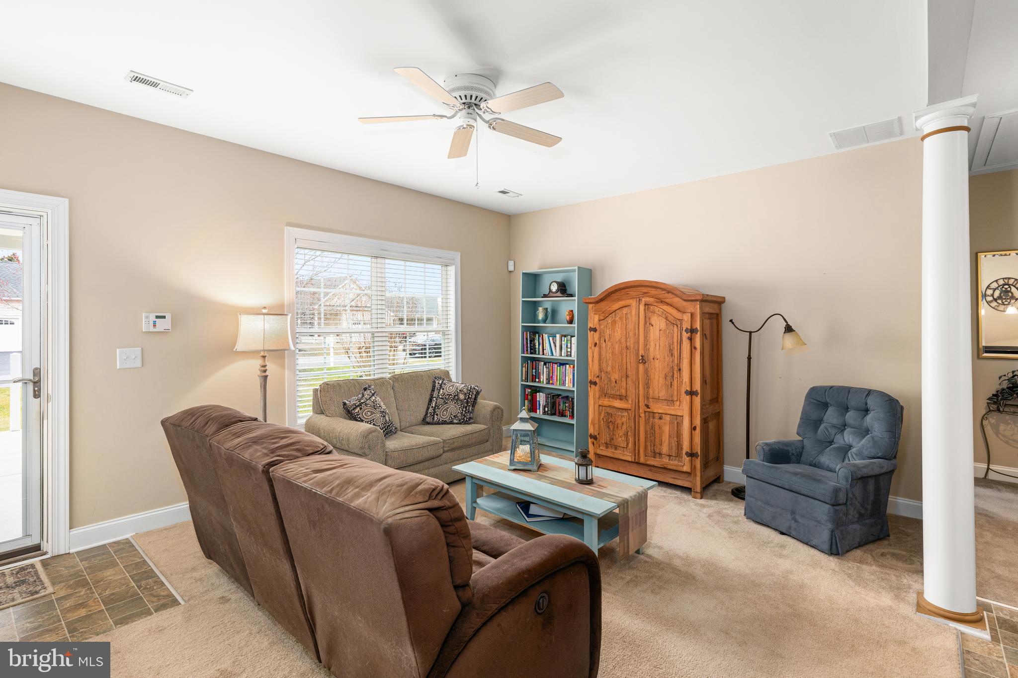 27400 Walking Run Milton, DE 19968 - Photo 4 of 35 a living room with furniture and a window
