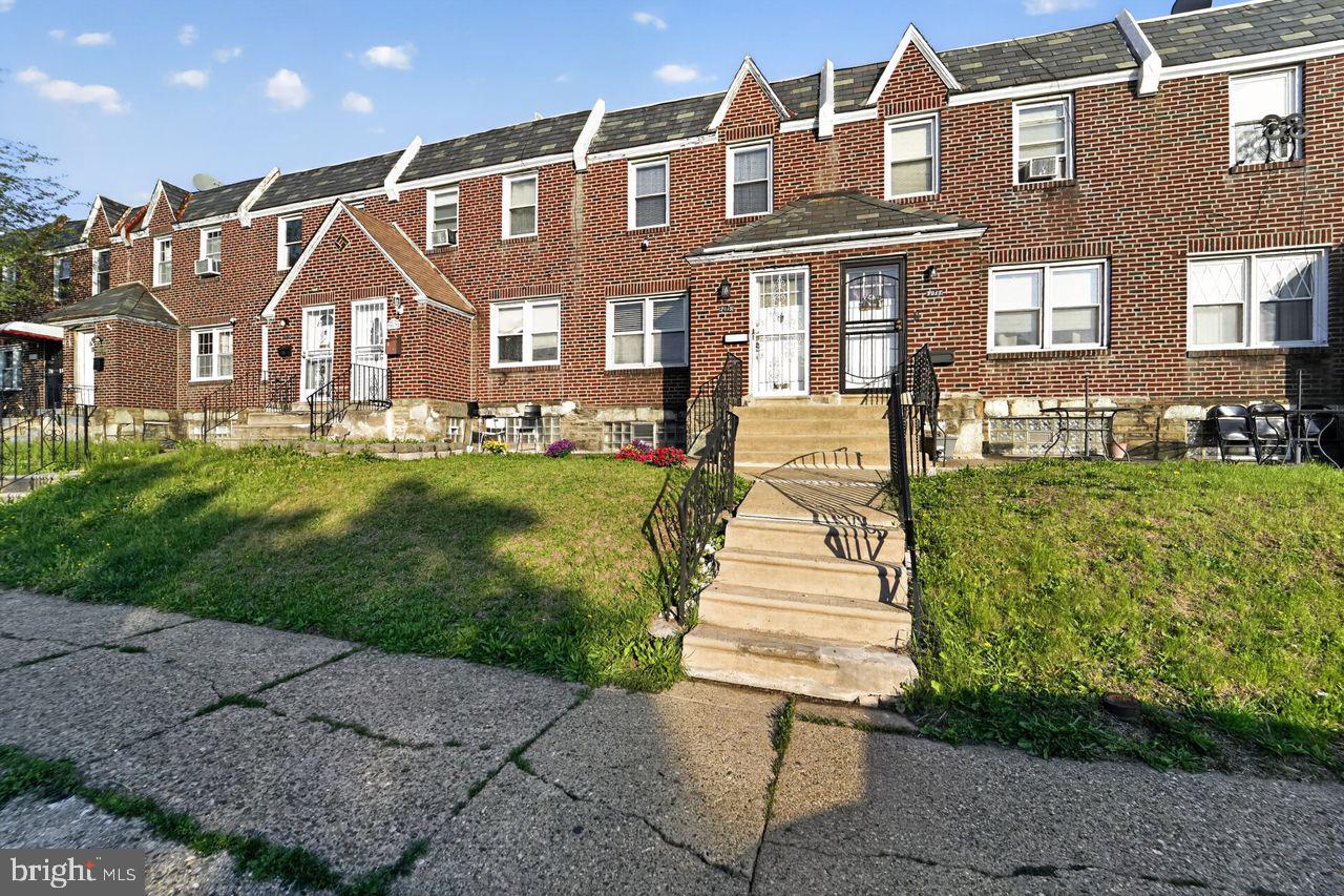 7015 Large Street Philadelphia, PA 19149 - Photo 1 of 26 Charming brick townhomes with greenery.