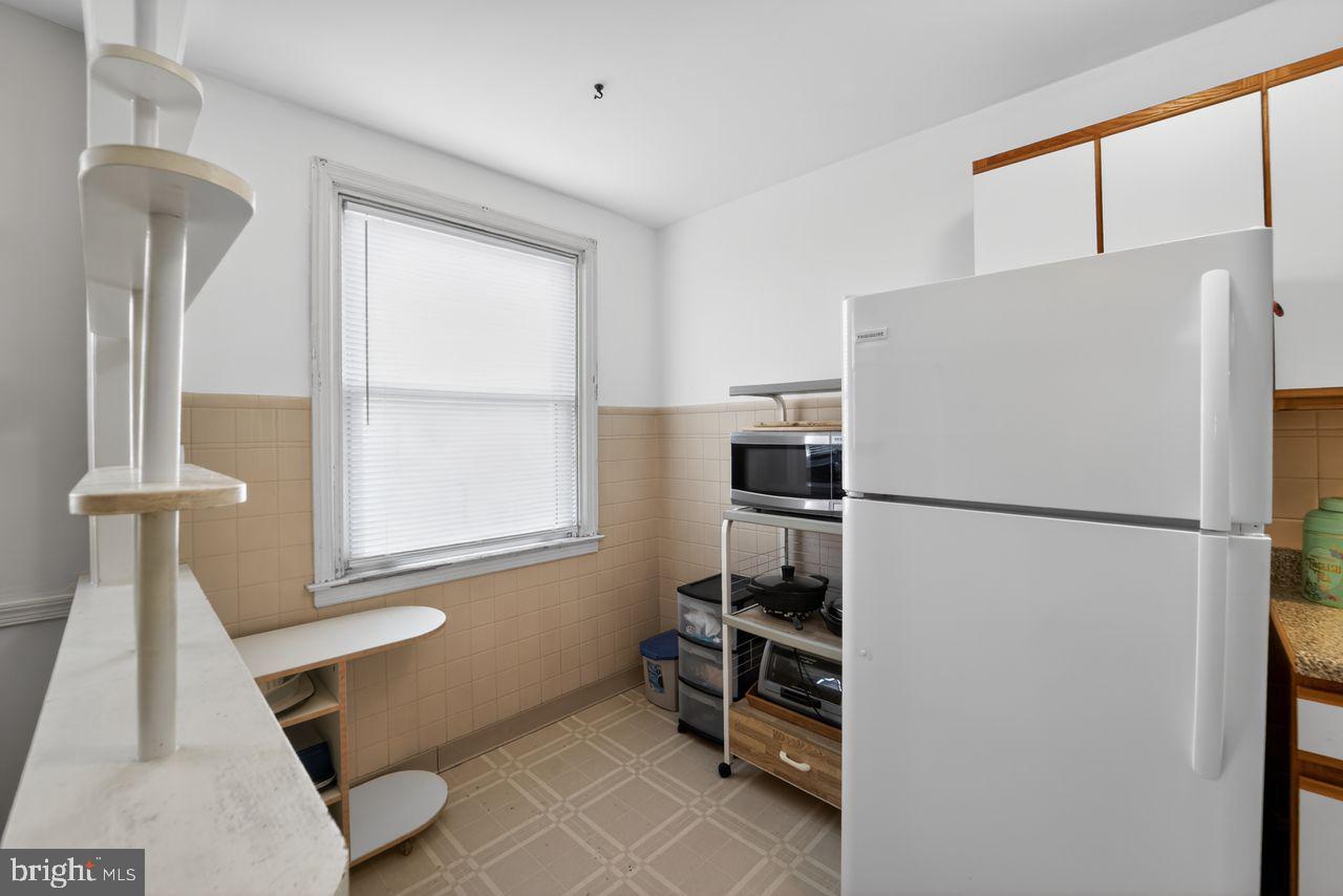 7015 Large Street Philadelphia, PA 19149 - Photo 14 of 26 Bright and functional kitchen space.