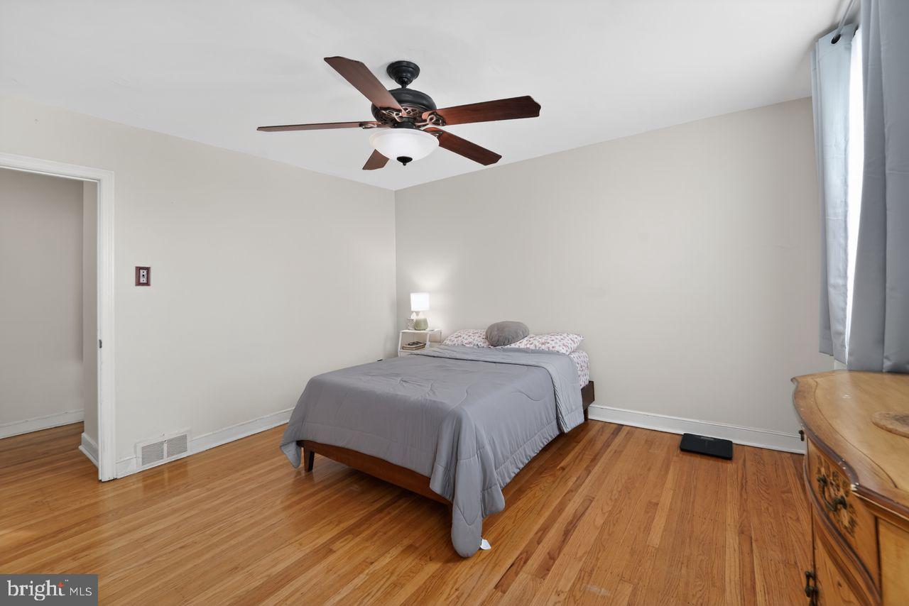 7015 Large Street Philadelphia, PA 19149 - Photo 18 of 26 Serene bedroom with warm wood floors.