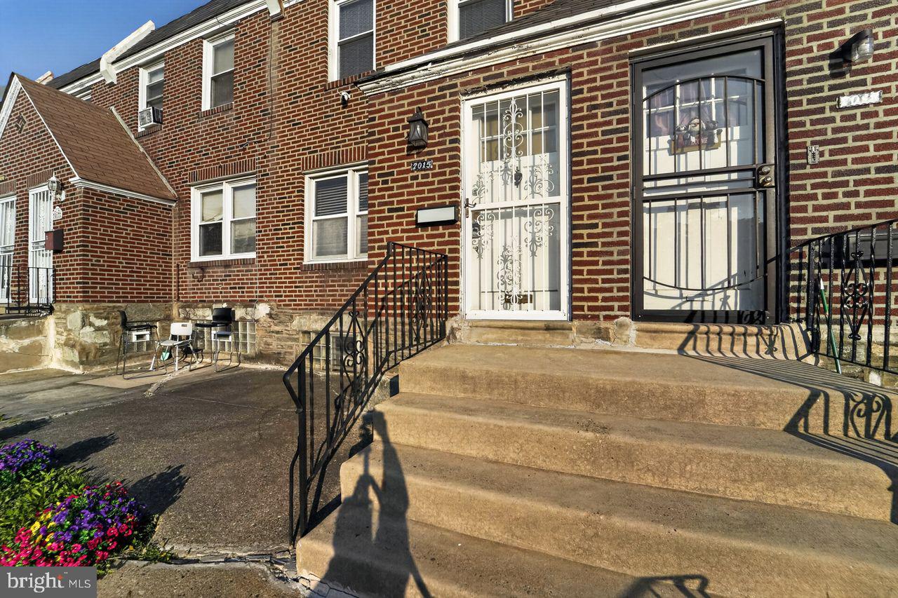 7015 Large Street Philadelphia, PA 19149 - Photo 2 of 26 Charming brick facade with inviting steps.