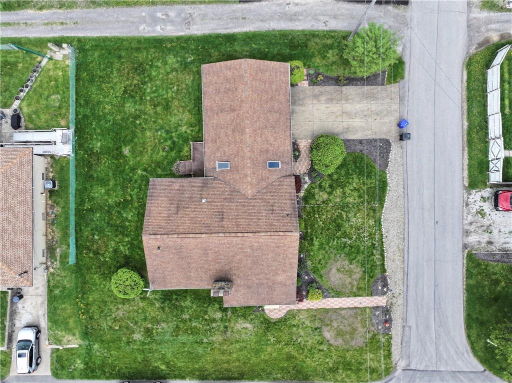 699 Kaye Avenue Monaca, PA 15061 - Photo 38 of 43 an aerial view of a house with a yard and garden