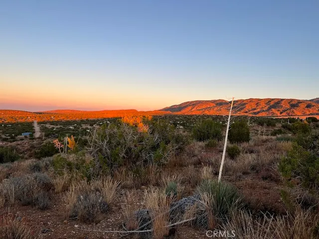 a view of lake and mountain