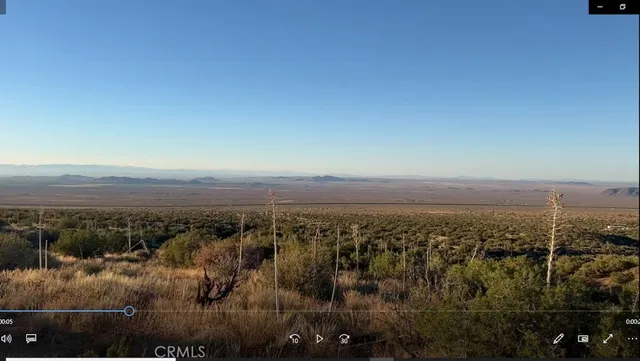a view of a car in front of a building