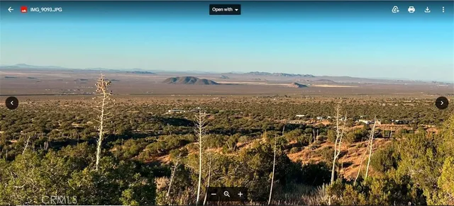 a view of lake with mountain