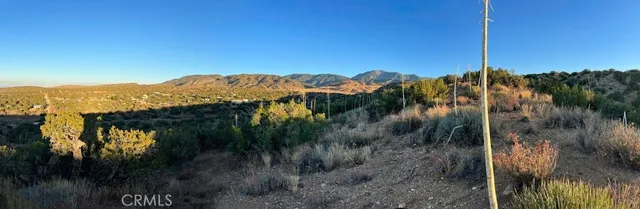 a view of a lake with a city