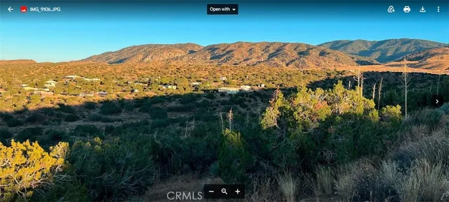 a view of a lake with a mountain in the background
