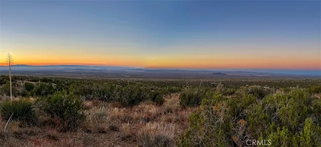 a view of lake with mountain