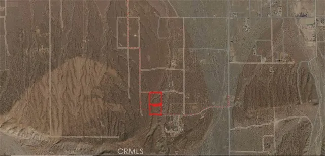 an aerial view of residential houses with outdoor and green space