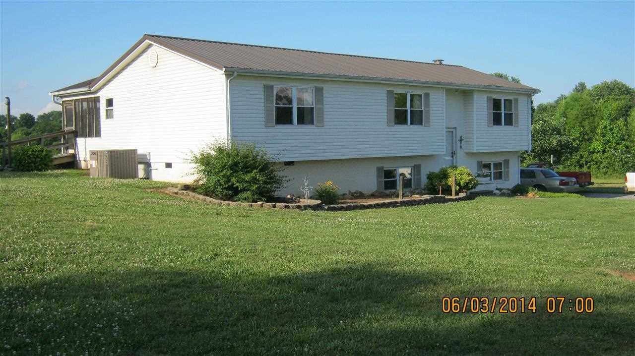 133 North Fork Road Madisonville, TN 37354 - Photo 1 of 1 a house view with a garden space