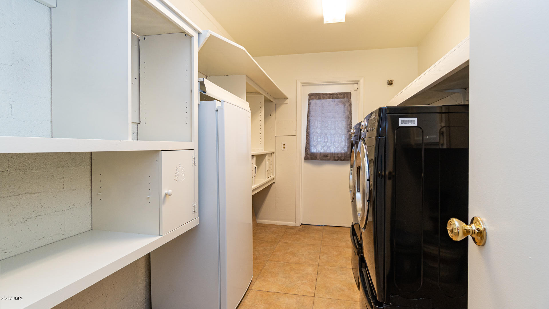 3015 West Calavar Road Phoenix, AZ 85053 - Photo 10 of 37 Large inside laundry