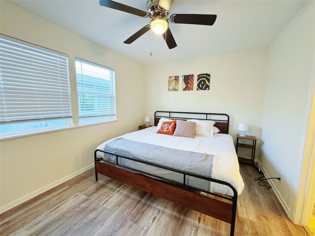 2405 Teri Road Austin, TX 78744 - Photo 14 of 18 a bedroom with a bed and window