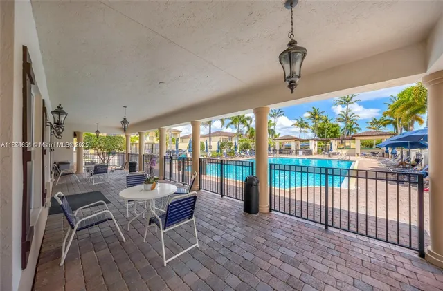 a living room with large windows