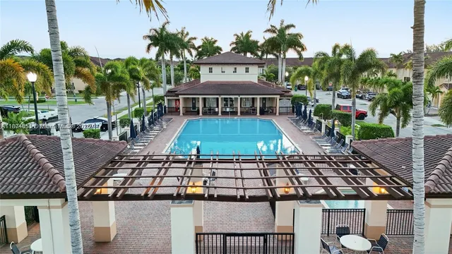 a view of a house with a swimming pool