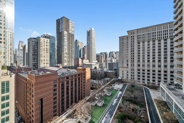 a view of a city with tall buildings