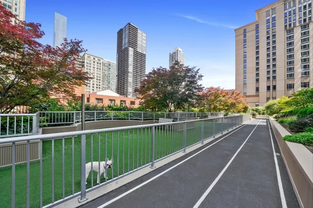 a view of swimming pool from a balcony