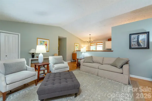 a living room with furniture and a couch