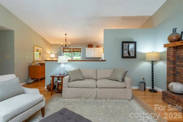 a living room with furniture and a couch