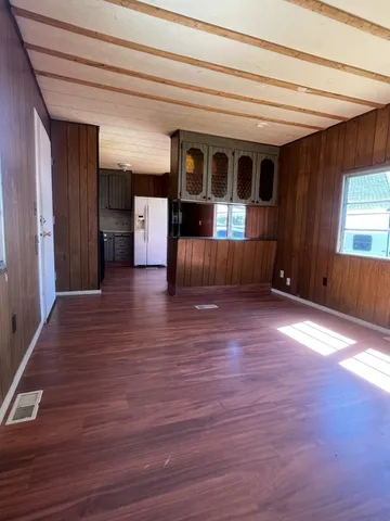 a view of livingroom with furniture and window