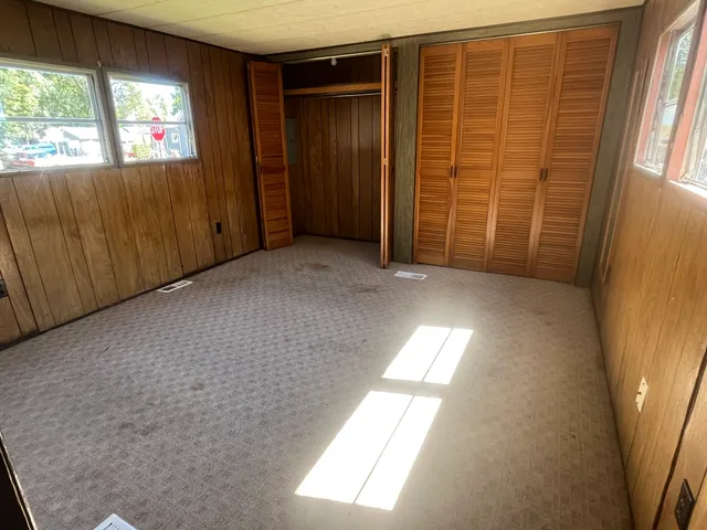 an empty room with windows