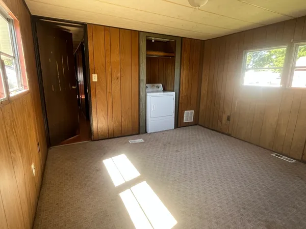 an empty room with windows