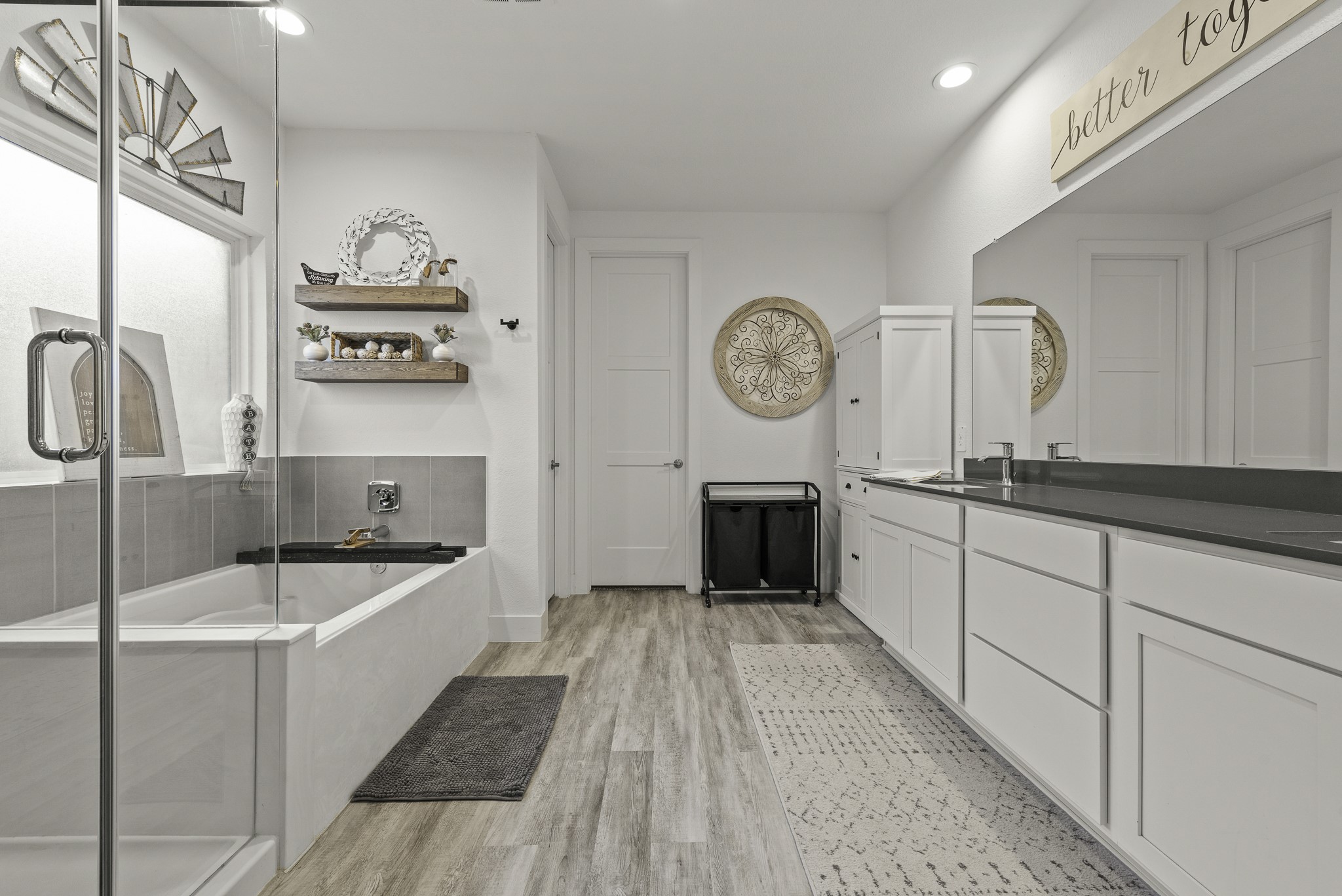10009 Gray Jay Court Conroe, TX 77384 - Photo 21 of 47 a spacious bathroom with a tub sink and mirror