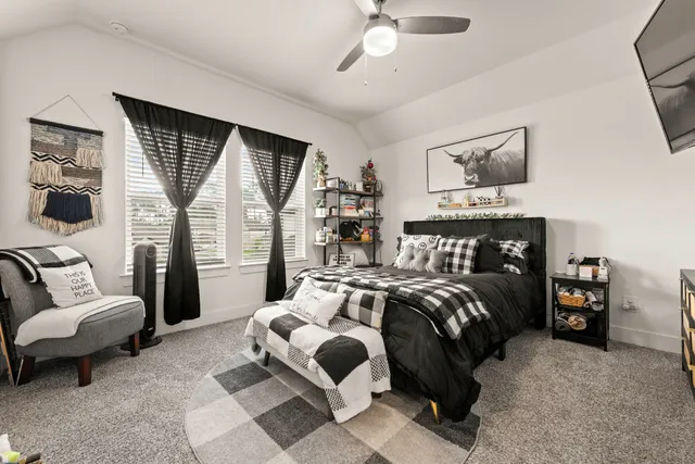 a bathroom with a sink toilet and mirror