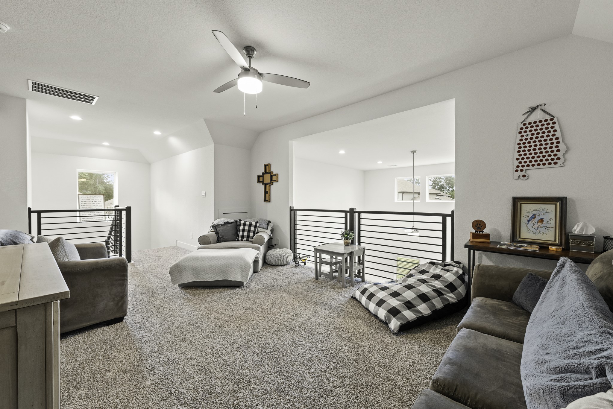 10009 Gray Jay Court Conroe, TX 77384 - Photo 36 of 47 a bedroom with furniture and a large window