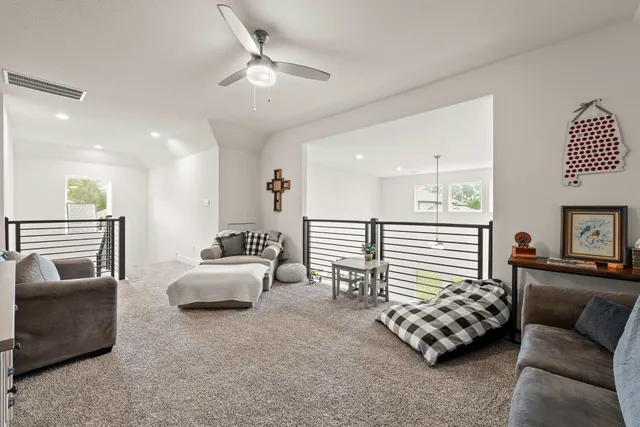 a view of a living room with furniture