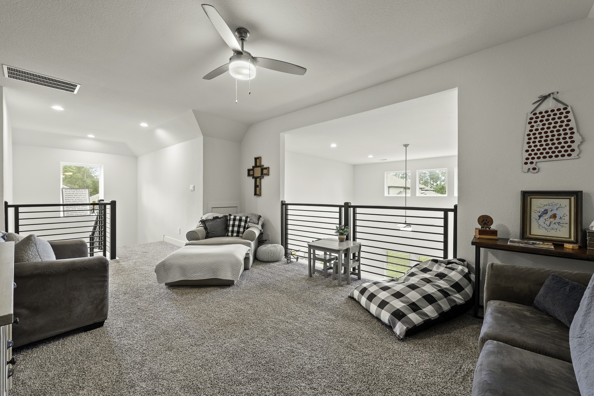 10009 Gray Jay Court Conroe, TX 77384 - Photo 37 of 47 a bedroom with furniture and a large window