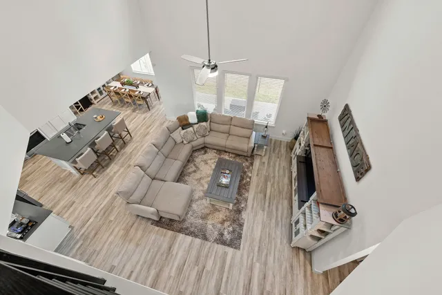 a view of a house with a yard porch and sitting area